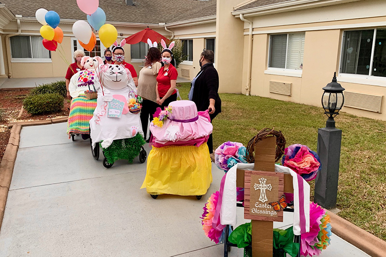 Associates at Life Care Center of Citrus County in Lecanto, Florida, with their Easter parade floats