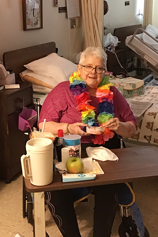 Resident Mary Beavers on Hawaiian Day