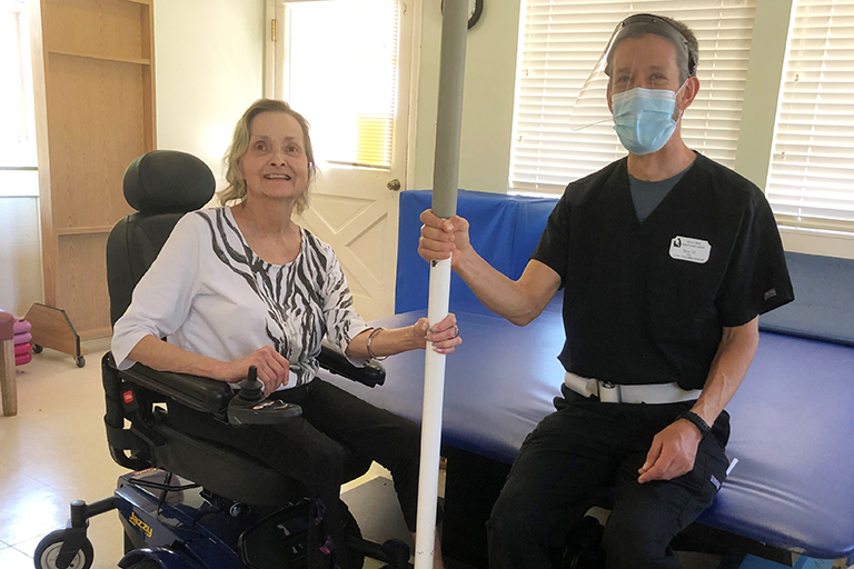 Kathleen with Ben Marean, physical therapist assistant