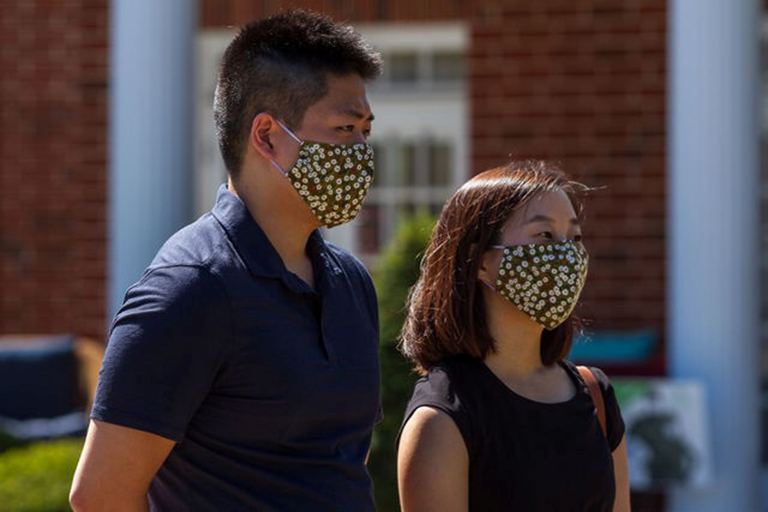 Rachel Park and her husband, Jonathan, attend the memorial service.