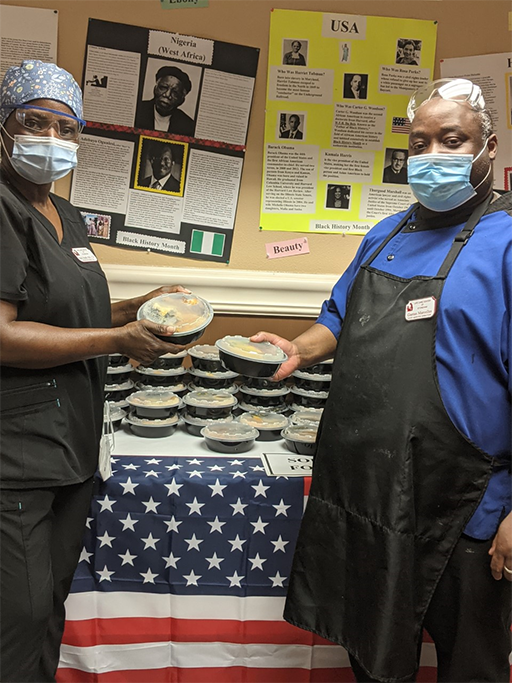 Ngozi Amadi, left, with Gaetan Marcellus, director of food services