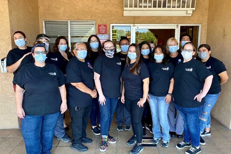 Associates at Heritage Health Care Center in their team shirts