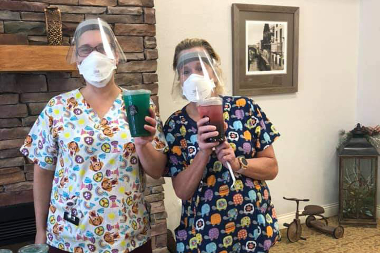 Rochester CNAs Rhonda Knee, left, and Deb Miller, with their teas