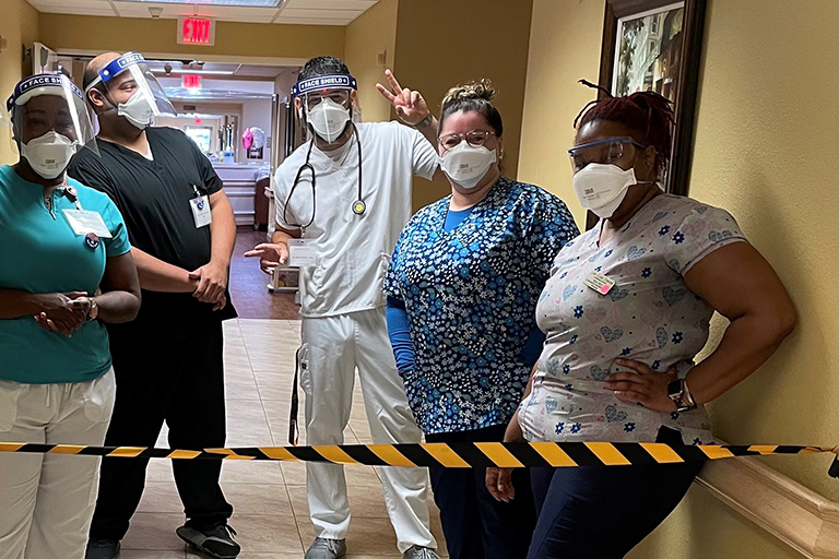 Some of the COVID unit staff (left to right): Rose Mesidor, certified nursing assistant; Alex Hernandez, registered nurse; Alvin Otero, licensed practical nurse; Maria Espinosa, LPN; and Dollmeshia Sanders, CNA