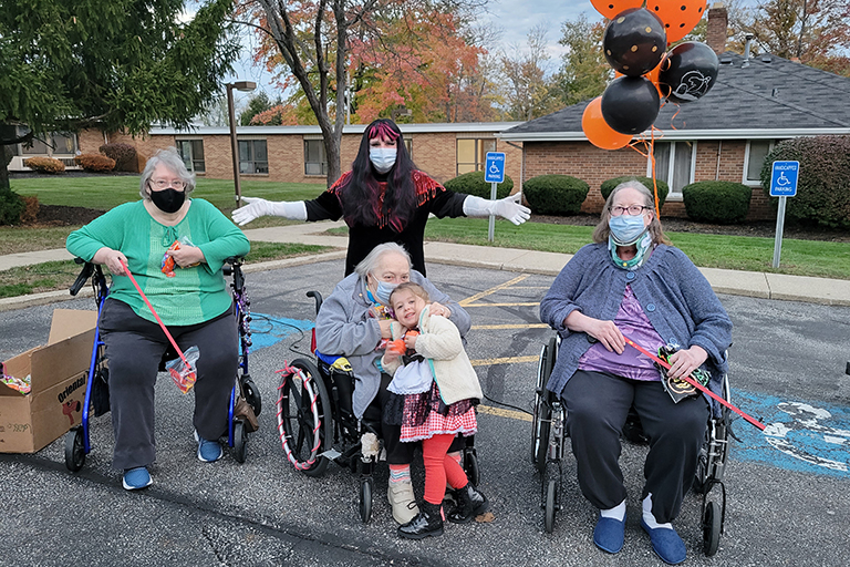 Residents and associates at LCC Medina at the trunk-or-treat