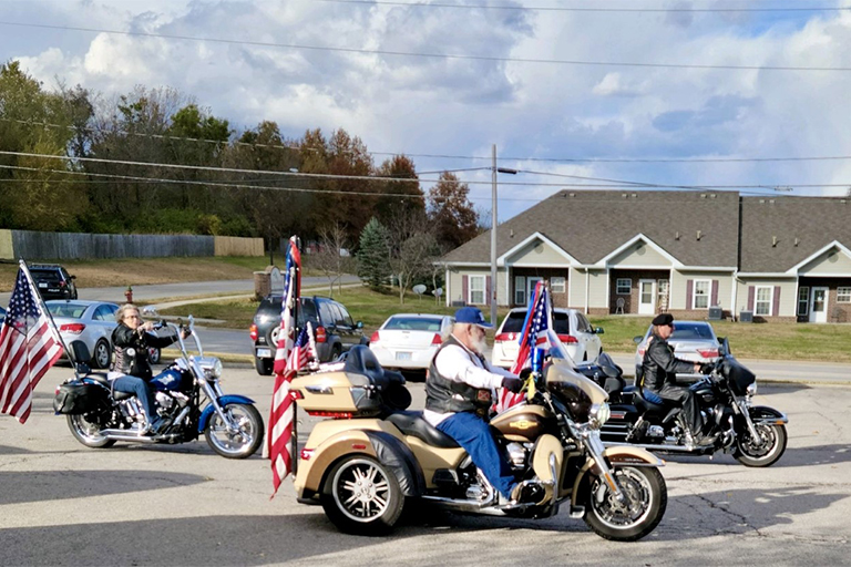 Legion Riders driving by LCC Osawatomie