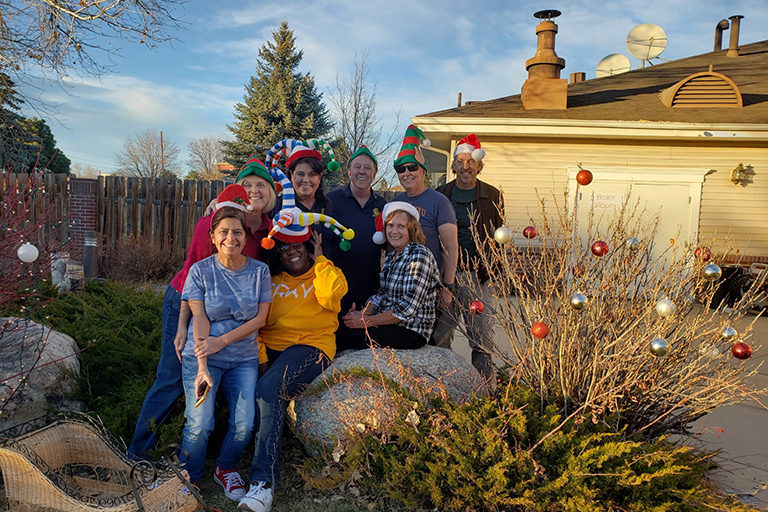 Members of the Purpose Driven Optimist Club in the courtyard