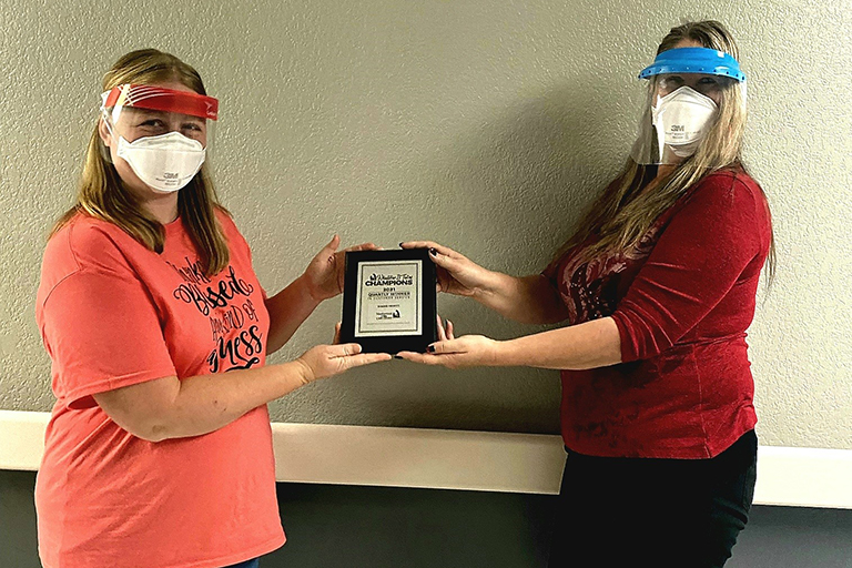 Sherri Hewitt, licensed practical nurse (left) with Rita Smithson, business office manager