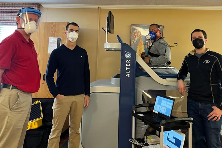 Left to right: Keith Screen, director of rehab at Heritage Healthcare, Dr. Daniel Hirai, Mike Melbis and Michael Holmes