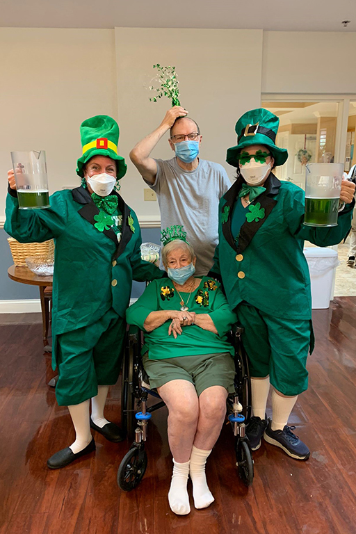 Life Care Center of Punta Gorda resident Dina Calabrese in front with (left to right) Victoria Naekel, activity director; Keith Broussard, Resident Council president; and Julie Hicks, activity specialist, in back