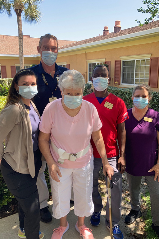 Juana De Dios Garcia with (left to right): Stephanie Yoda, occupational therapist; Todd Smith, assistant director of rehab; and certified nursing assistants Ben Bosse and Debra Shreve