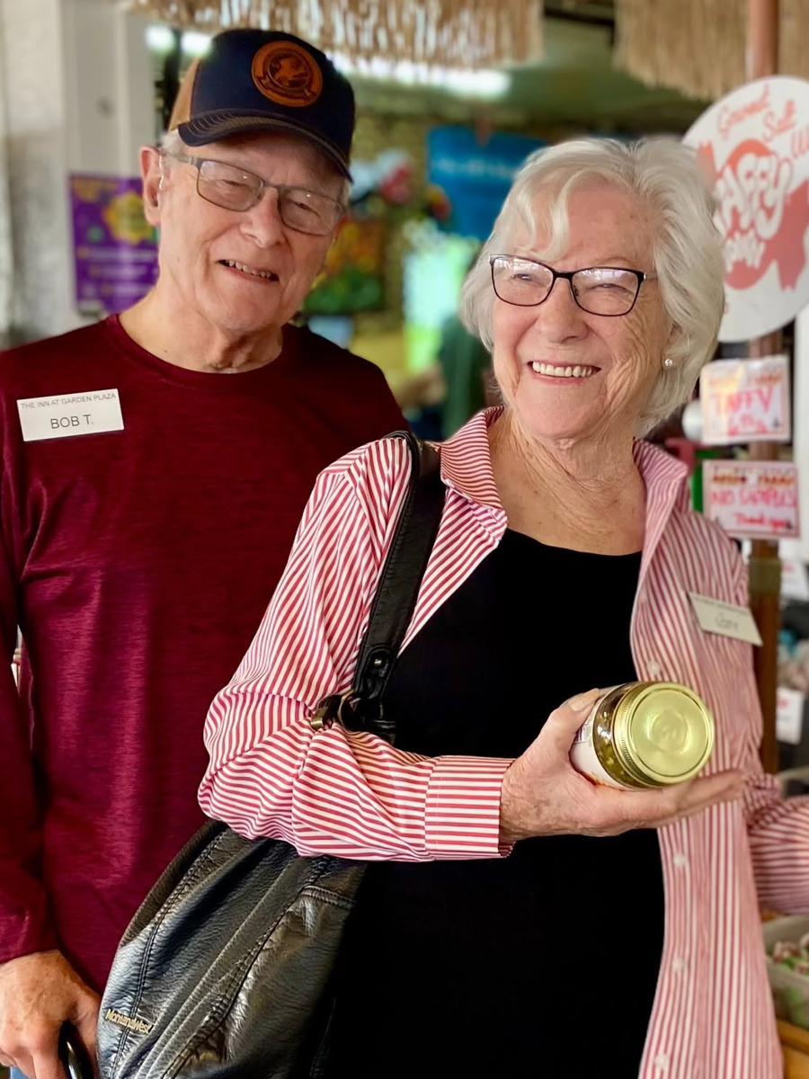 MussoFarms.jpeg Senior man and woman smiling while shopping for produce
